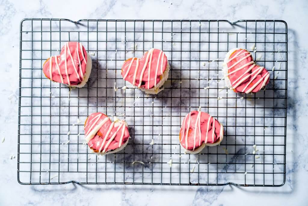 For a healthier twist on the classic Little Debbie Valentine's Day cakes, these Mini Strawberry Heart Cakes with a Greek yogurt frosting are an adorable and delicious way to celebrate the day.